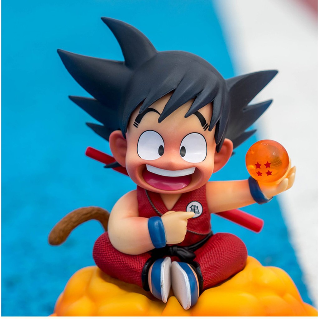 Mô hình Dragonballz Goku Kid ngồi cân đẩu vân tay cầm ngọc rồng