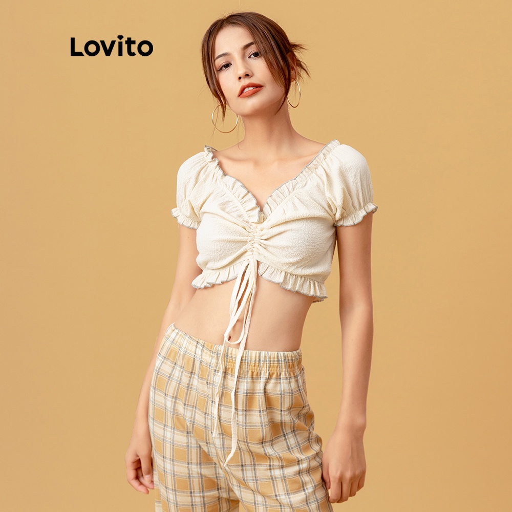 Áo Lovito phối dây rút nhún bèo lai áo màu trơn giản dị L05609 (màu be) | BigBuy360 - bigbuy360.vn