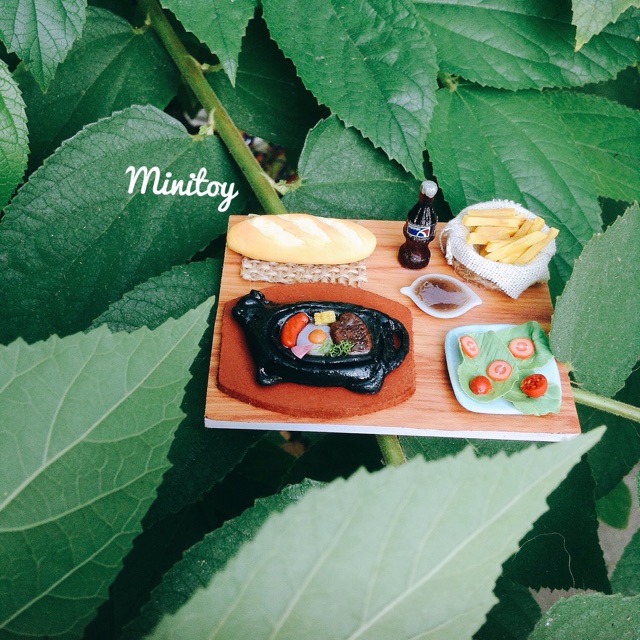 Bò né thu nhỏ bằng đất sét