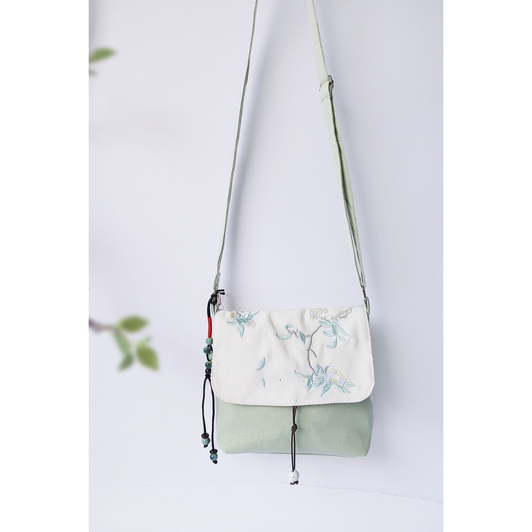 Túi đeo chéo thêu cổ phong