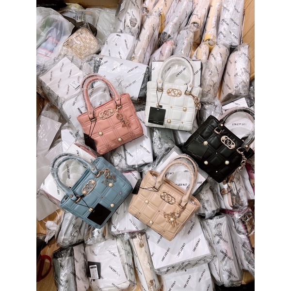 Túi lyn tay cầm dáng lady