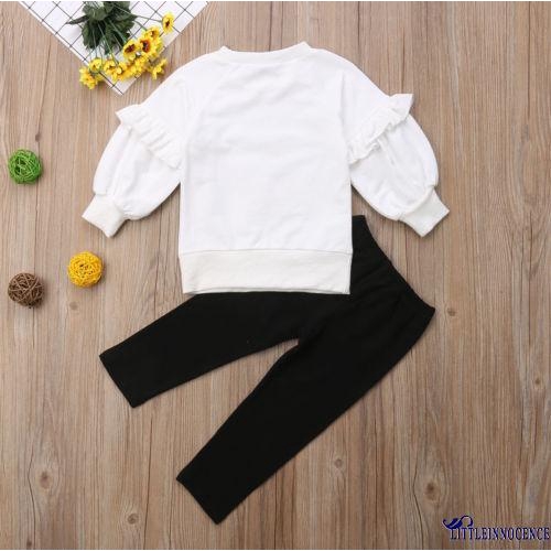 Bộ trang phục gồm áo tay dài và quần đen xinh xắn cho bé gái sơ sinh