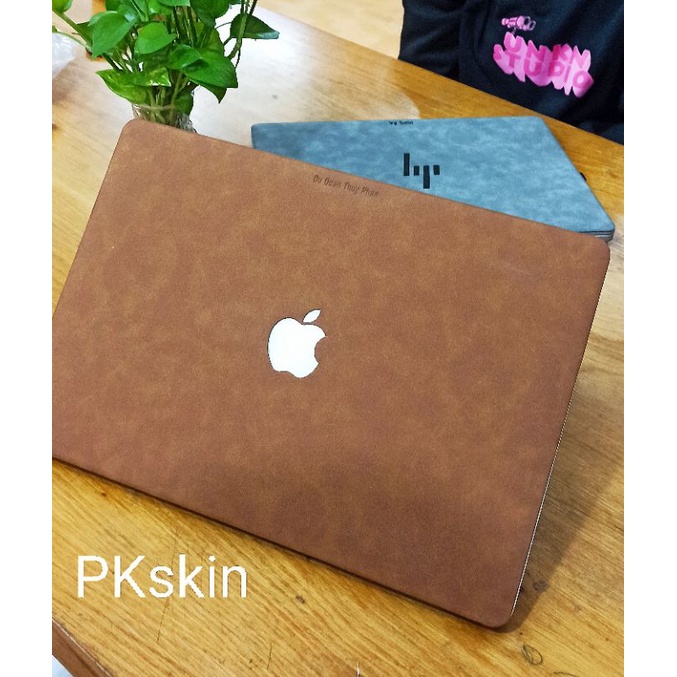 Miếng dán skin da cho laptop HP và Macbook