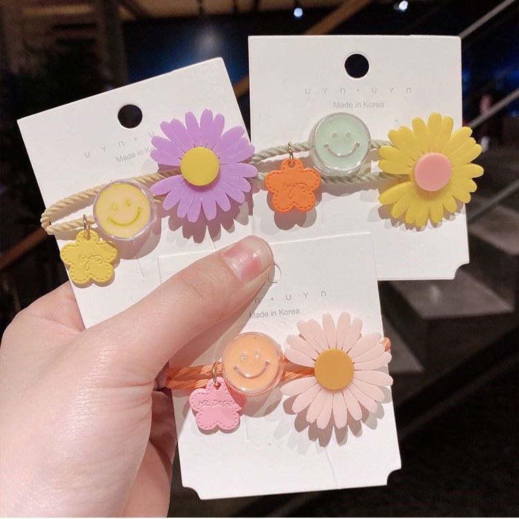 Dây thun buộc tóc đính hoa hướng dương nhỏ cho bé gái