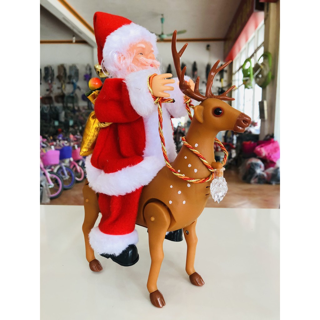 [XẢ KHO] Ông già noel cưỡi tuần lộc đi phát quà [HÀNG ĐẸP] có nhạc, cử động ngộ nghĩnh, tặng kèm pin