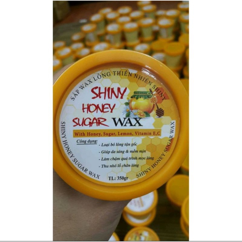 Wax tẩy lông shiny- Bộ sản phẩm triệt lông tay lông chân và lông nách_ gồm 1 bộ giấy wax và que gỗ