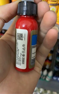 Mực xăm môi màu đỏ tươi