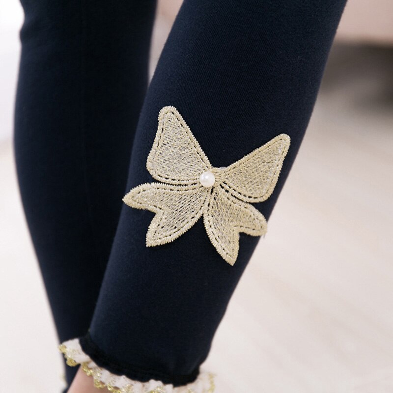 Quần legging màu trơn thêu họa tiết nơ bướm dễ thương cho bé gái