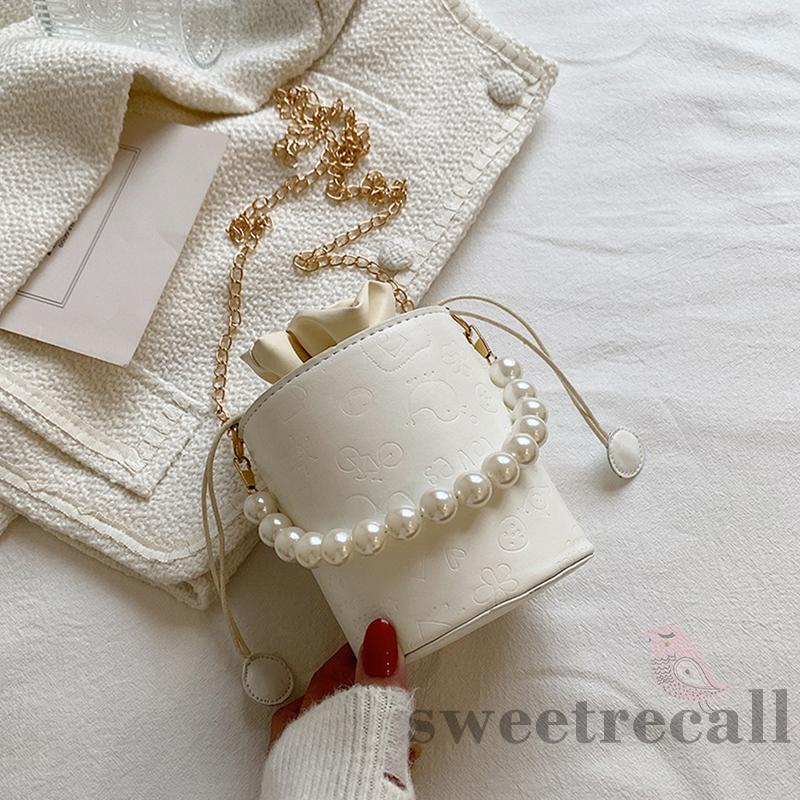 Túi xách có dây ngọc trai đeo vai khóa dây rút họa tiết dập nổi màu trắng phong cách vintage dành cho nữ