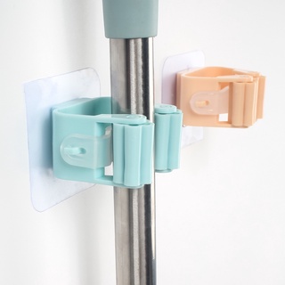 Móc dán tường giữ cây lau nhà tiện lợi

