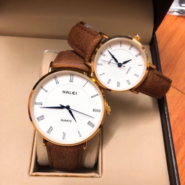 MỘT_ĐỔI_ MỘT TRONG 7 NGÀY- Căp đồng hồ đôi nam nữ  Halei dây da nâu kim xanh mặt trắng thanh lịch, sang trọng