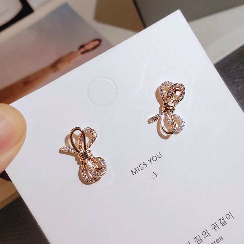 Khuyên tai JIUDUOLAN mạ bạc thiết kế nơ ruy băng đính đá nhân tạo màu vàng hồng thời trang dành cho nữ