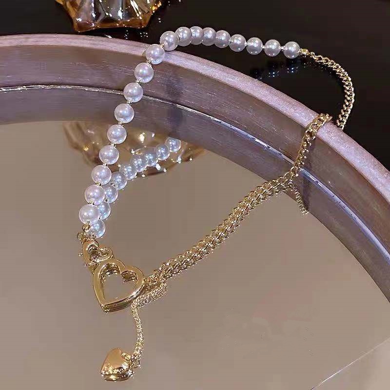 Vòng cổ hạt trai trái tim ulzzang