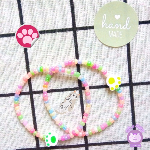 Vòng tay hạt cườm màu pastel charm bàn chân pet đáng yêu