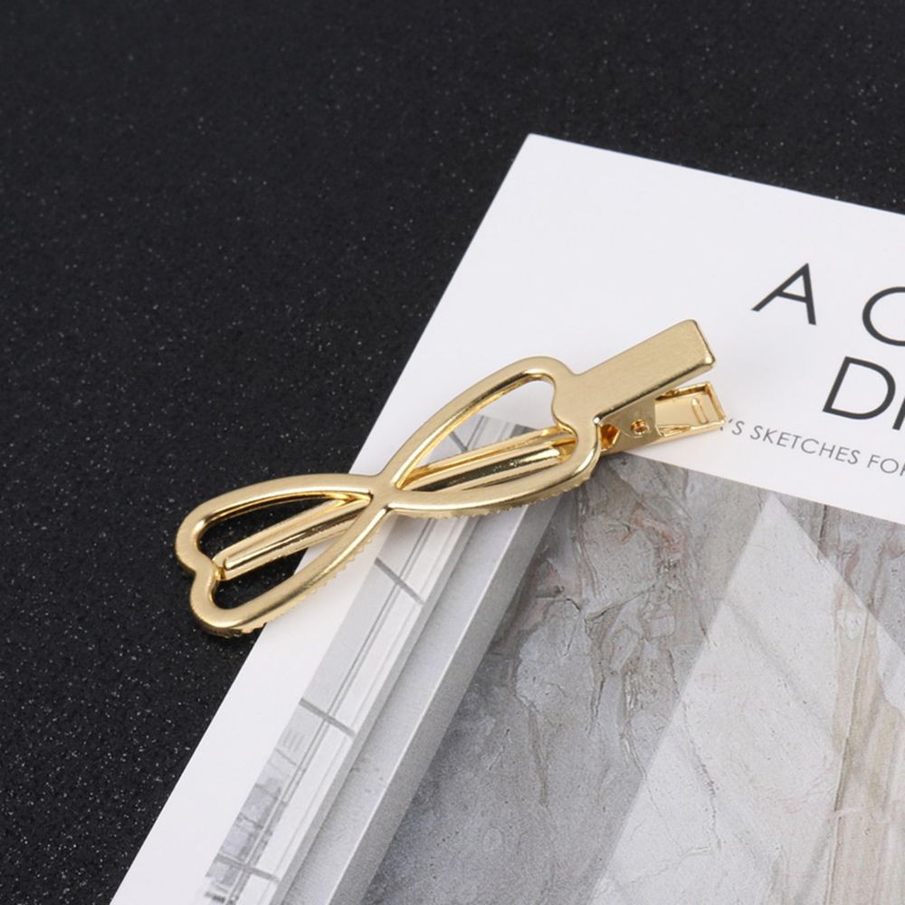 Kẹp tóc hình nơ rỗng