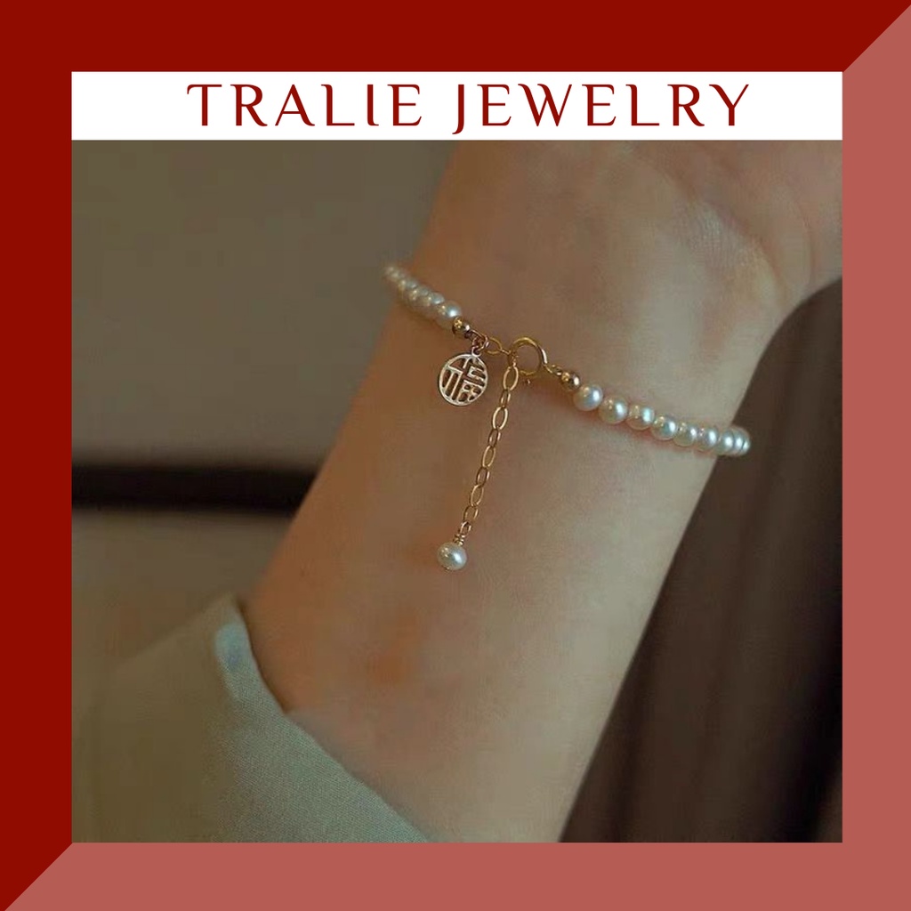 Vòng tay ngọc trai nhân tạo mạ vàng khắc chữ "Fu" Tralie Jewelry VIP02