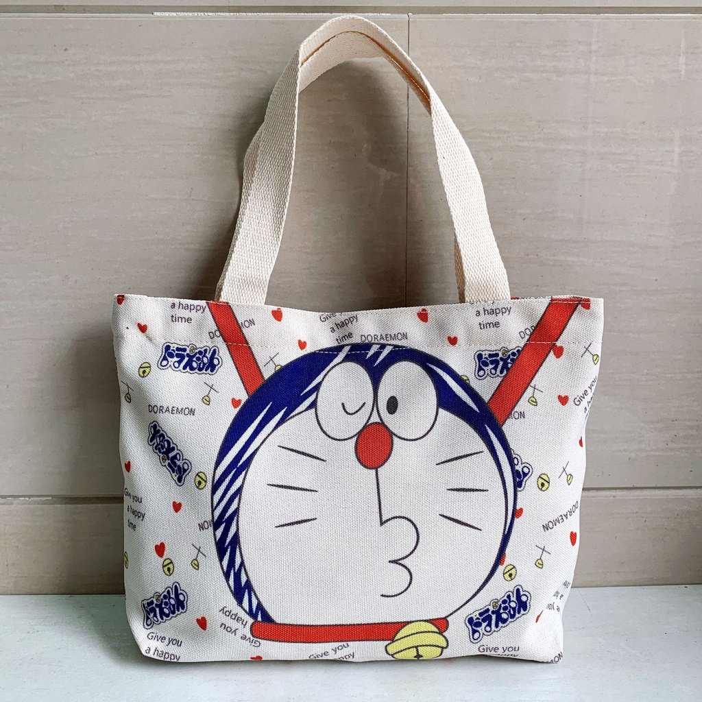 Túi xách đeo vai bằng vải canvas in họa tiết Doraemon đáng yêu cho nữ