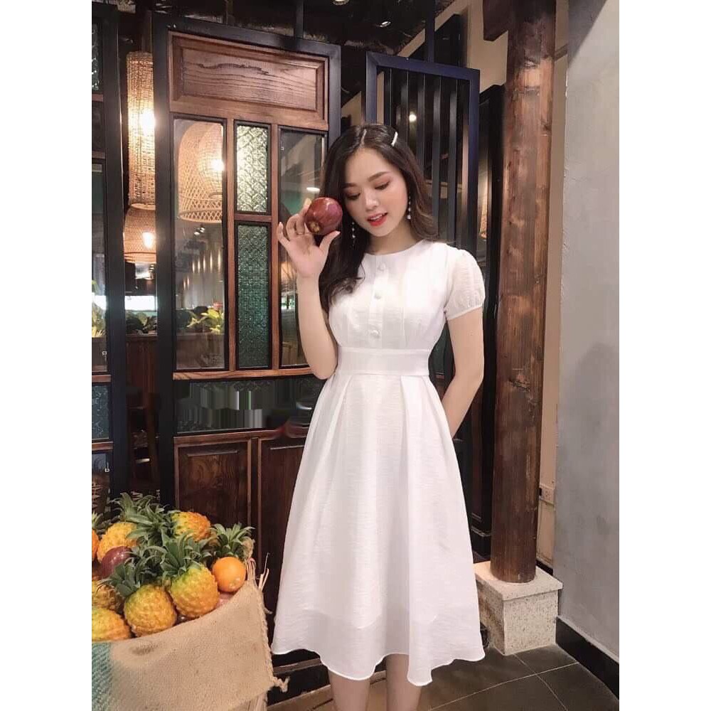 Đầm tay con đính nút