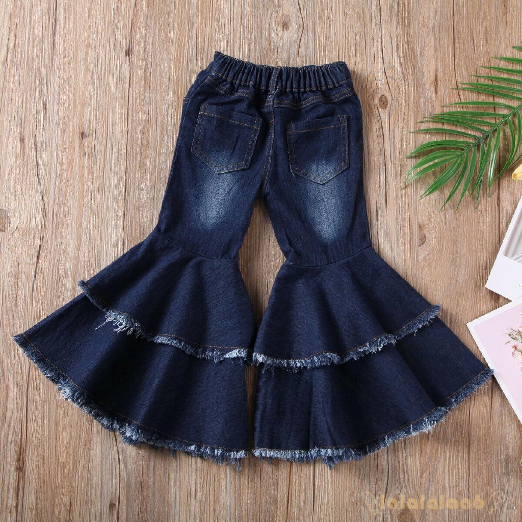 Quần jeans dài ống loe phối tua rua thời trang cho nữ