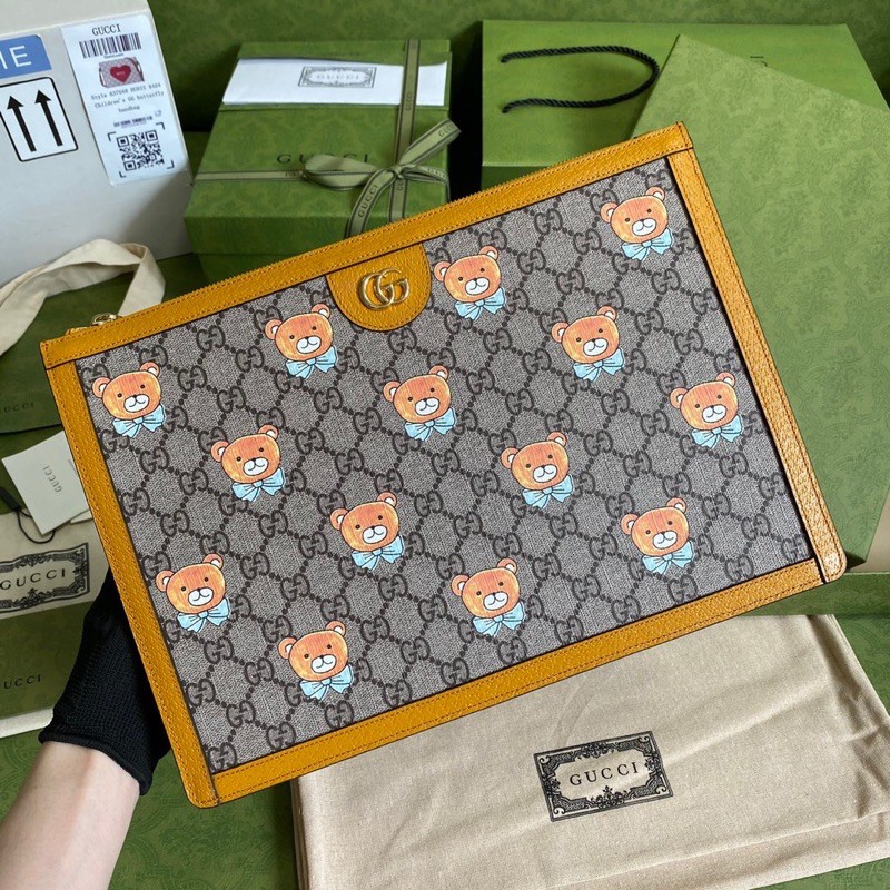 Cluth cầm tay cho nam Gucci GC gấu Kai da thật cao cấp hàng vip 1-1