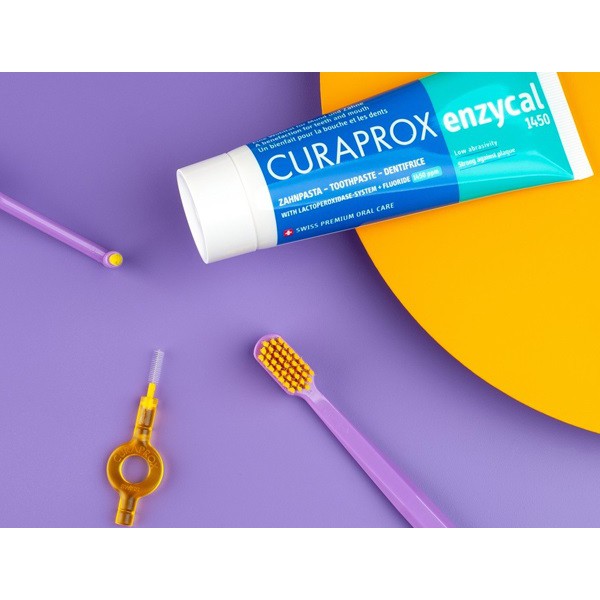 Kem đánh răng Curaprox Enzycal 1450 ngừa sâu răng 75ml