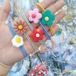 Cột tóc hoa nhí