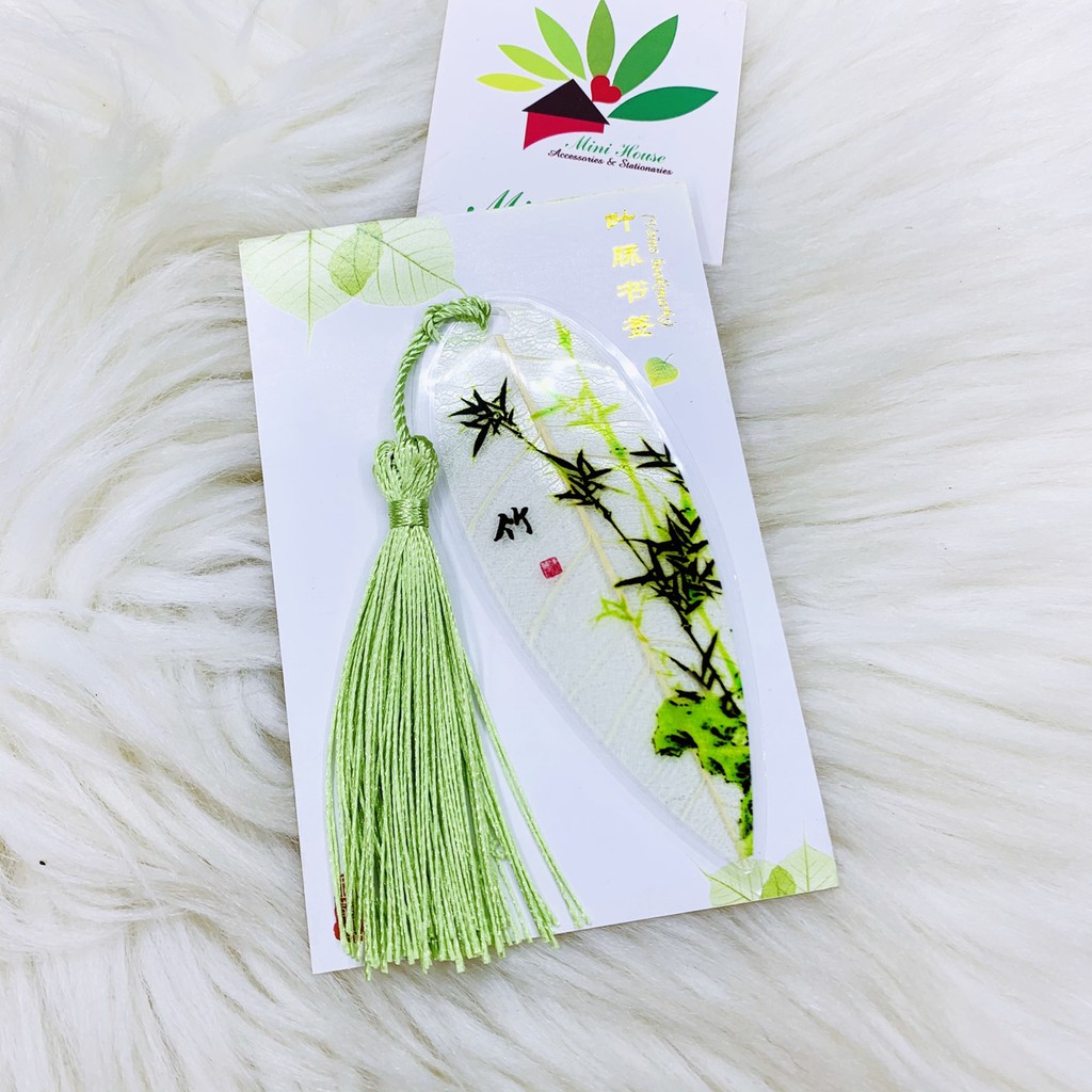 Bookmark gân lá mộc lan có dây tua rua chỉ bóng dùng đánh dấu sách, trang trí, mẫu hình hoa sen, mẫu đơn