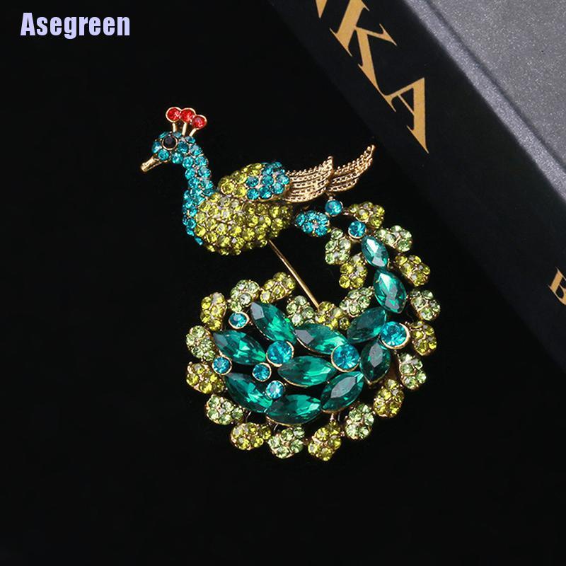 Ghim cài áo hình chim công đính đá xanh lá thời trang