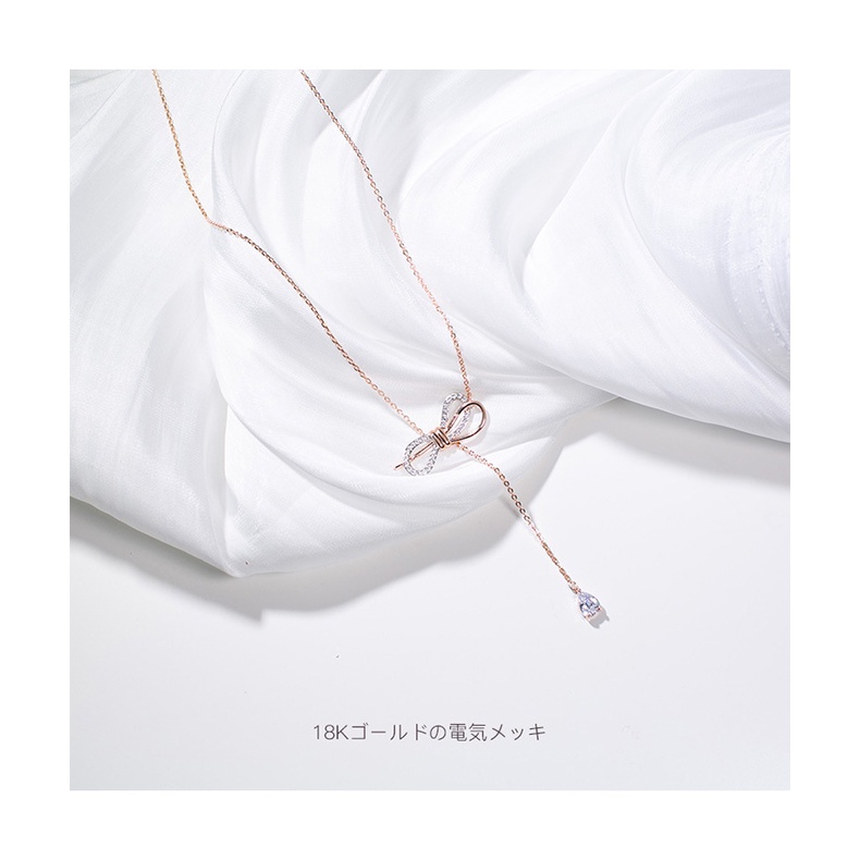 Dây chuyền thép titan mạ vàng hồng 18K hình nơ đính kim cương phong cách Hàn Quốc