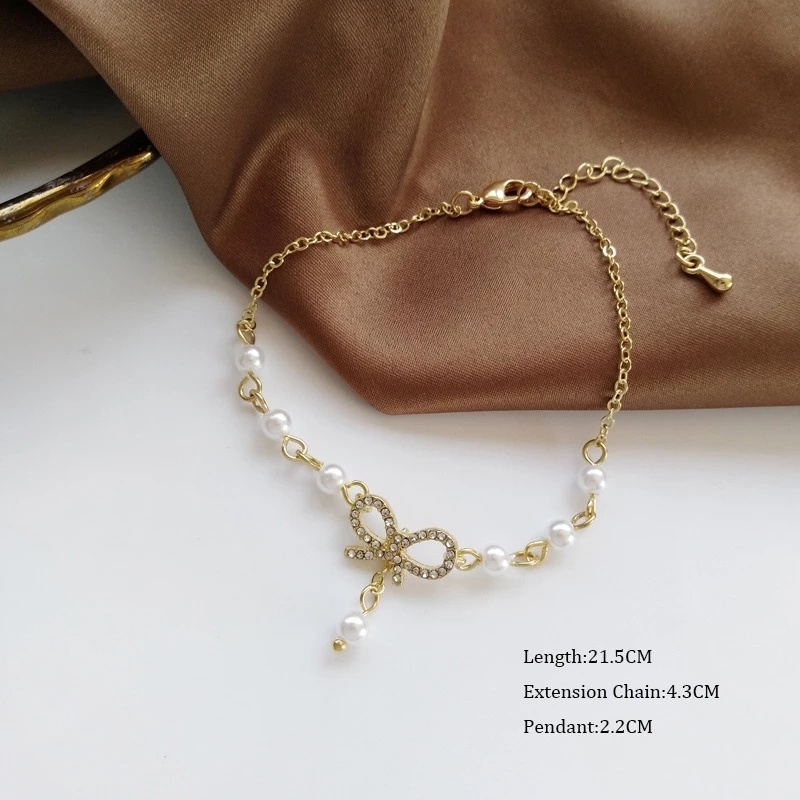 Vòng tay hợp kim mỏng trang trí nơ đính ngọc trai thời trang cho nữ