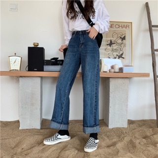 Quần jeans cài nút eo phủ gót