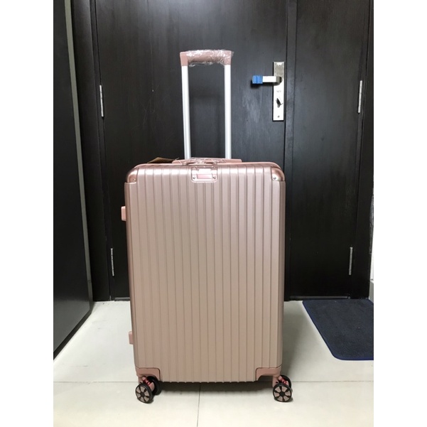 Vali nhựa màu rose gold, size 26, xoay 360 độ