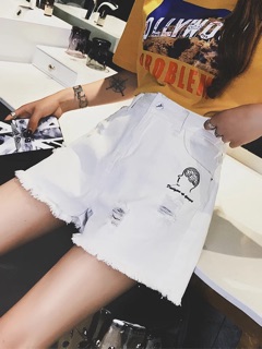 Quan jeans 2 mau trang va den