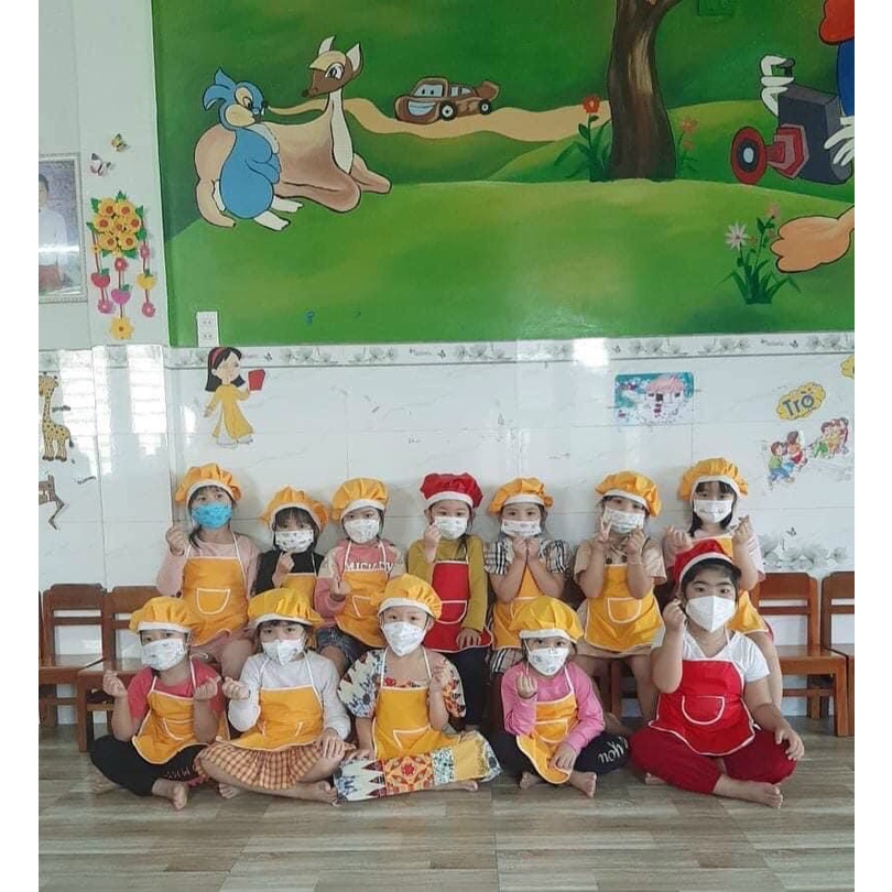 Tạp dề và mũ cho bé có 7 màu chất liệu 2 lớp kèm mũ