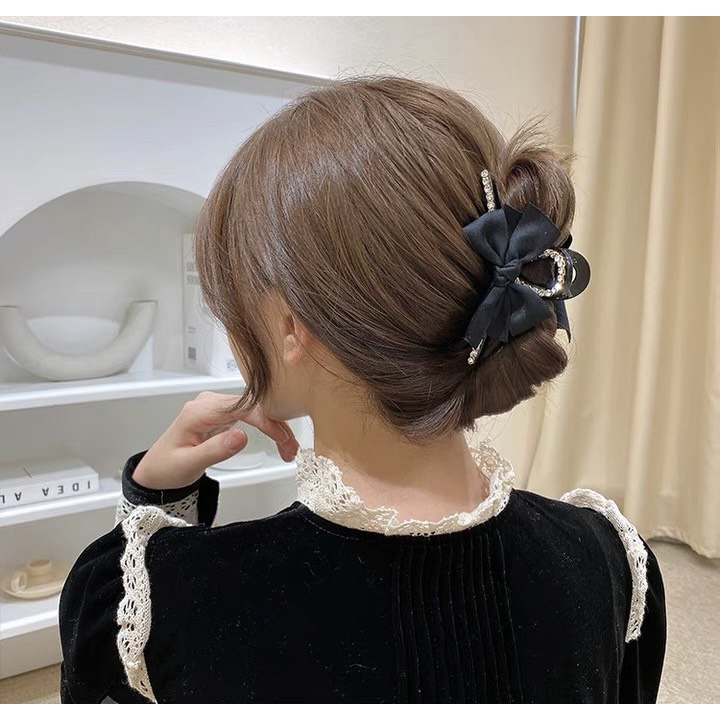 Kẹp tóc nhựa phối nơ công chúa Caria