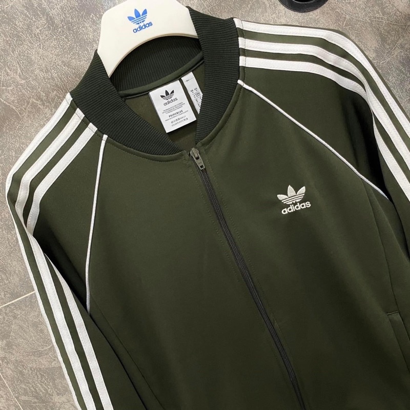 Bộ Quần Áo Bomber Unisex Nam Nữ Adidas SST Track Jacket Xanh Rêu