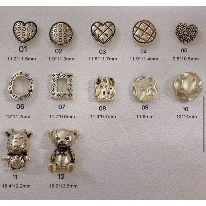 Charm gấu đồng, trái tim đồng