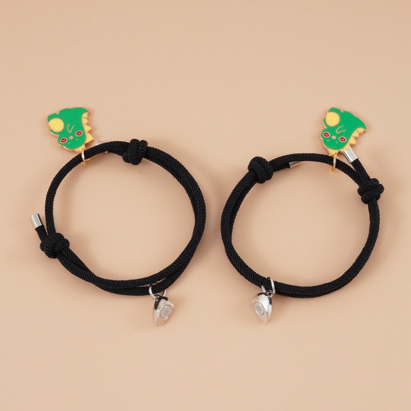 Set 2 vòng tay màu đen phối mặt hình khủng long có nam châm hình trái tim thời trang cho cặp đôi