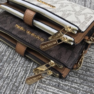 Ví cầm tay Michael Kors - gập