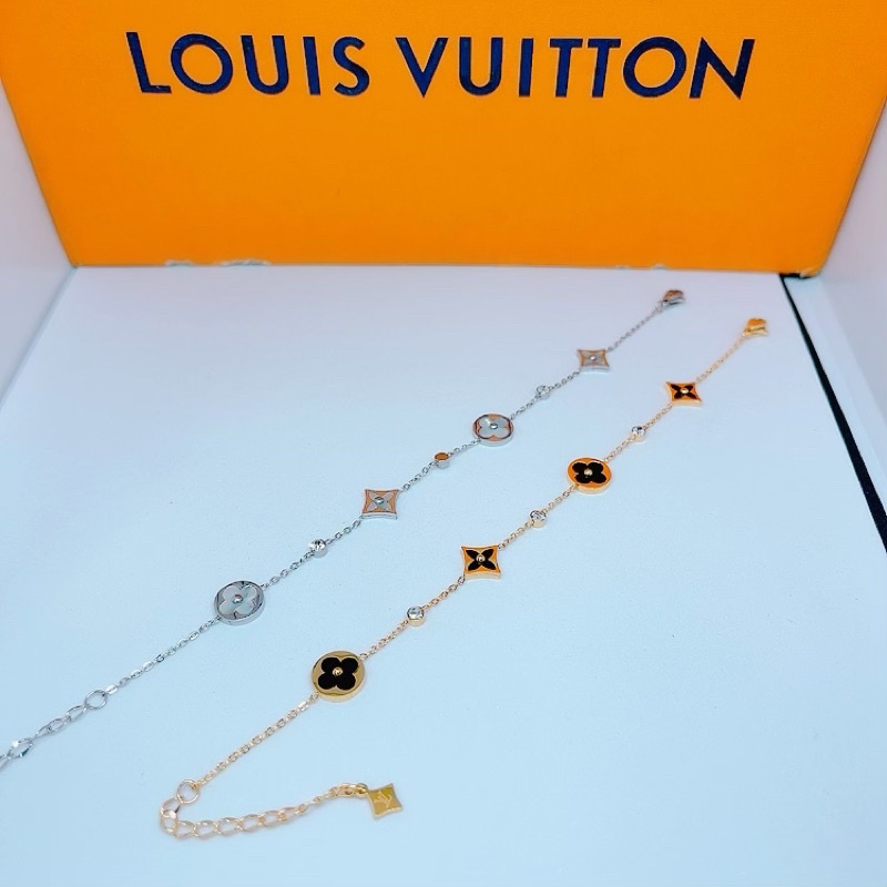 Lắc tay titan V trắng - vàng ko đen