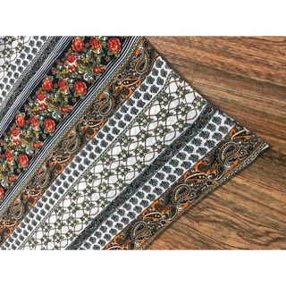 Vải họa tiết thổ cẩm hoa hồng cam