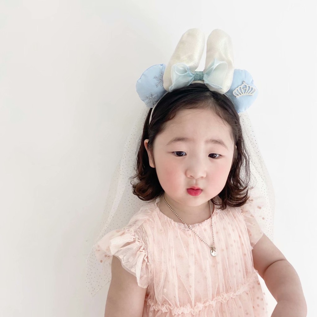 Cài nơ bạch tuyết cho bé