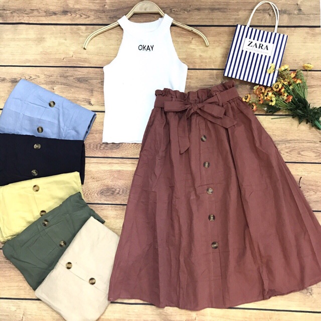 Chân váy kaki nơ bản khuy gỗ hàng Quảng Châu