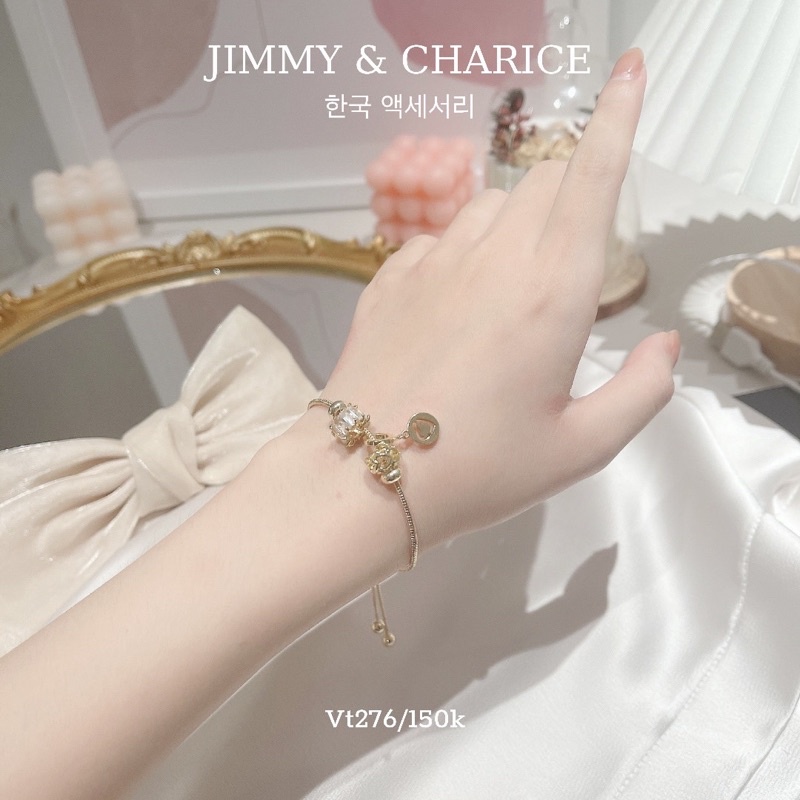 Lắc tay charm Jimmy & Charice dây rút 2 màu | BigBuy360 - bigbuy360.vn