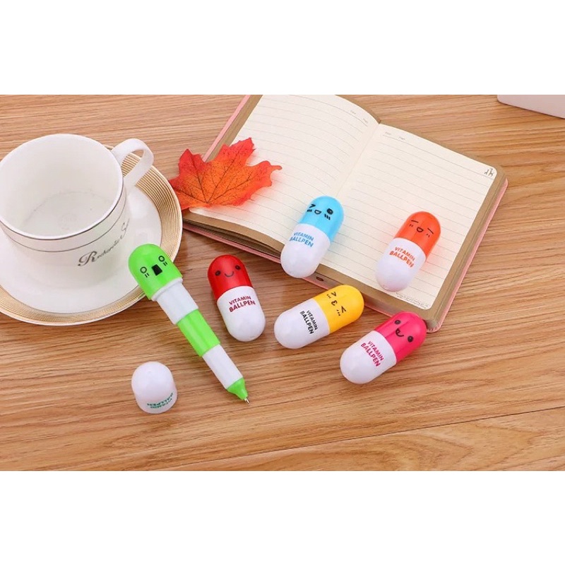 Bút bi nước hình viên th.uốc mặt cảm xúc xinh