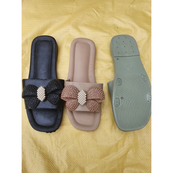 Dép nữ quai ngang đế nhựa dẻo mềm êm chân có gắn nơ dễ thương.
