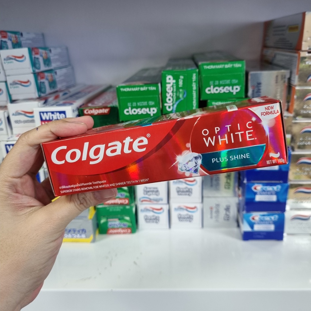 Kem đánh trắng răng COLGATE Optic White Plus Shine 100g [trắng sáng răng sau 1 tuần sử dụng]