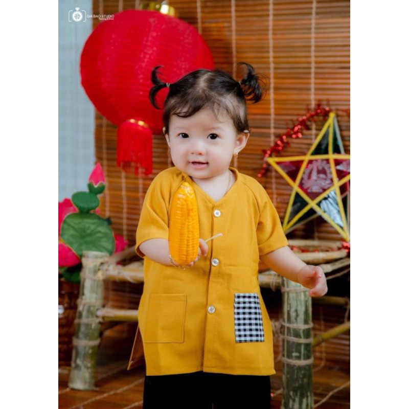 Áo bà ba màu vàng cho bé