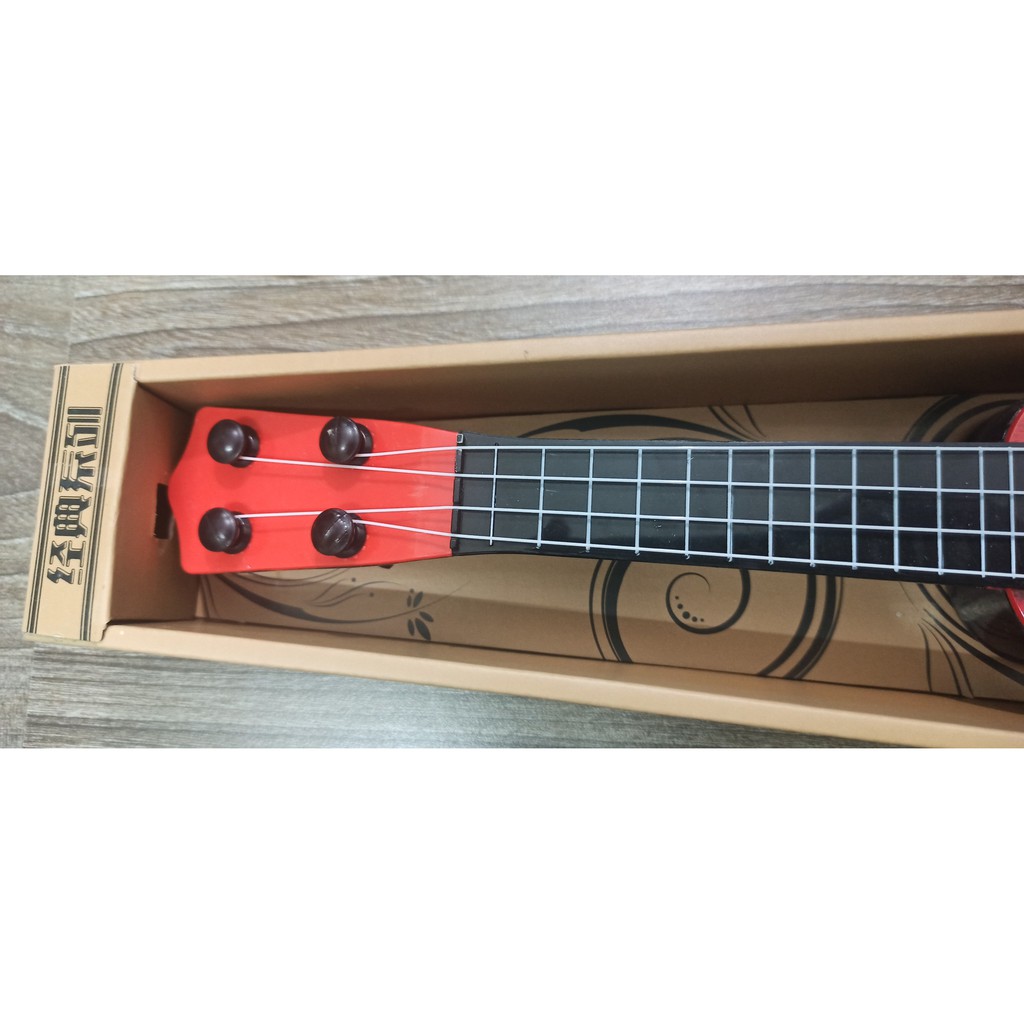 Đồ chơi Đàn Guitar Mini-Ukulele Foxi phát nhạc và nhạc cụ -Bé vừa chơi vừa học phát triển trí tuệ-Bé thỏa