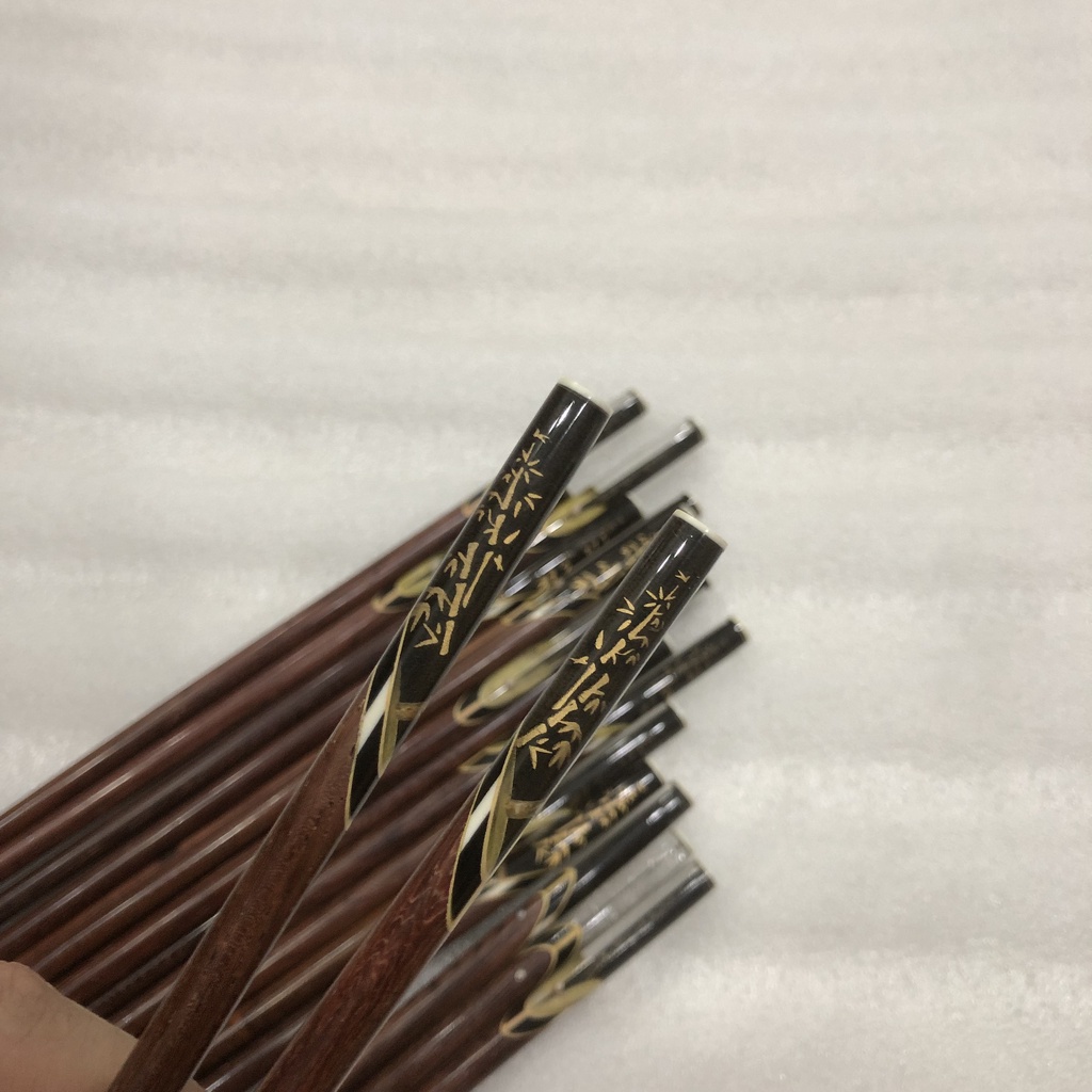 Đũa ăn gỗ Cẩm lai tự nhiên cao cấp đầu ốc biển in họa tiết trúc phát quang - bộ 10 đôi